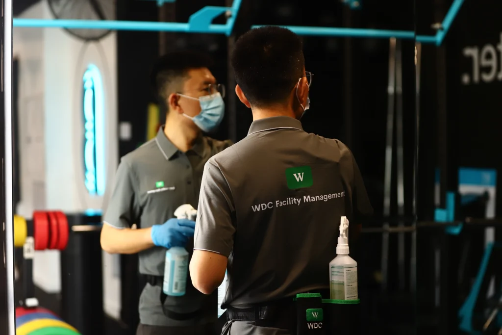 Cleaning supervisors discussing facility management and shift protocols.