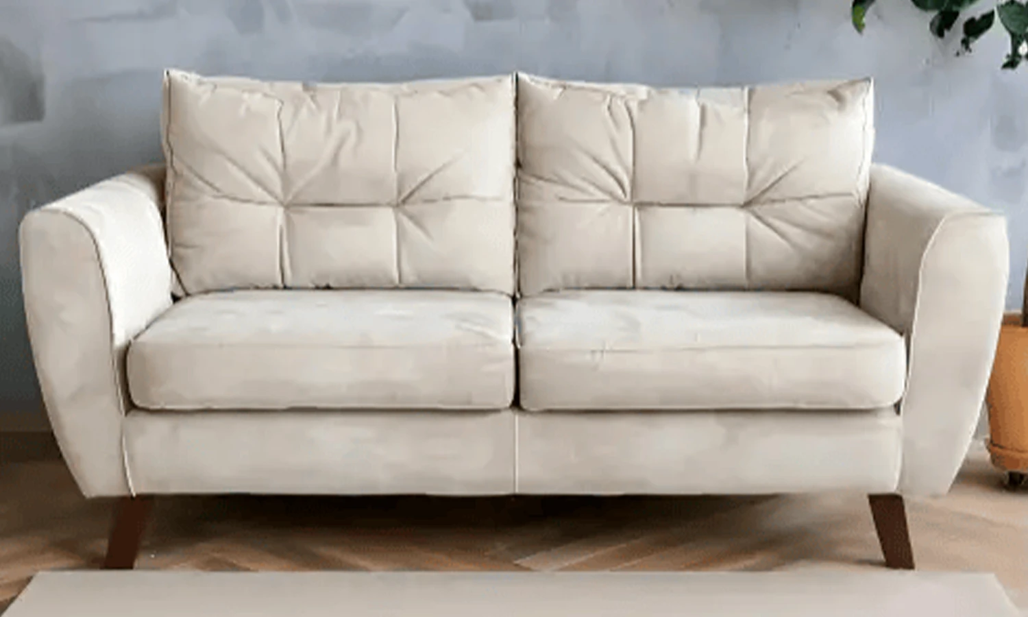 before-5 Sanitized white tufted leather sofa in a corporate reception area.